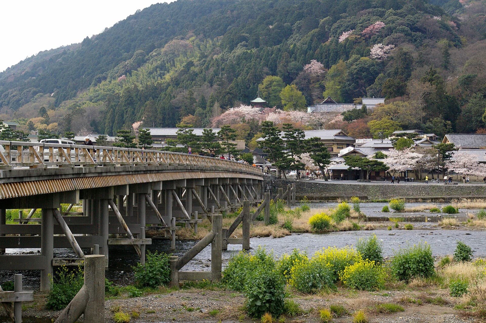 Togetsukyo Bridge across the river at Arashiyama, with the hills behind