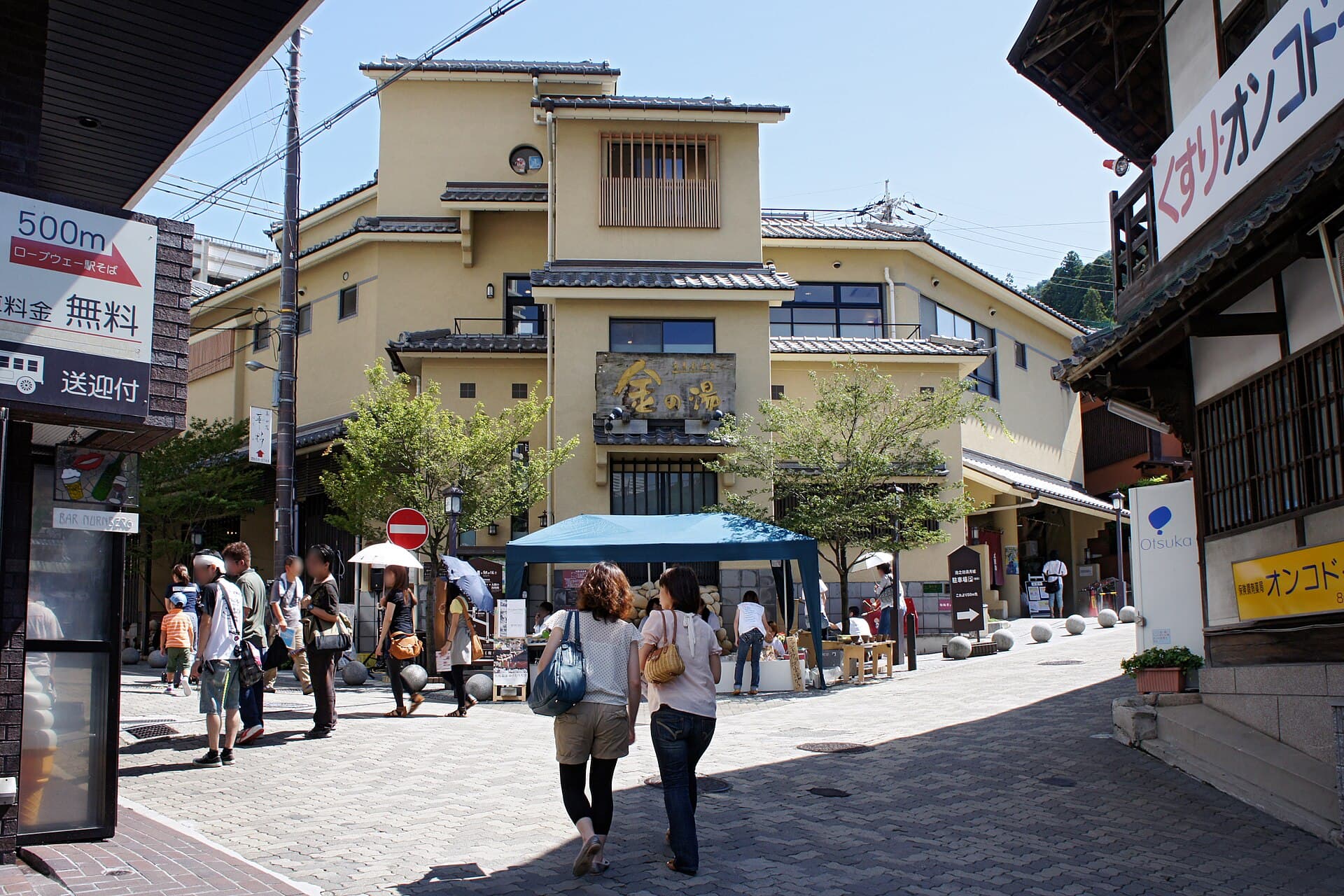 Kin no Yu, the public bathhouse for Arima's brown kinsen water, on a street in Arima Onsen