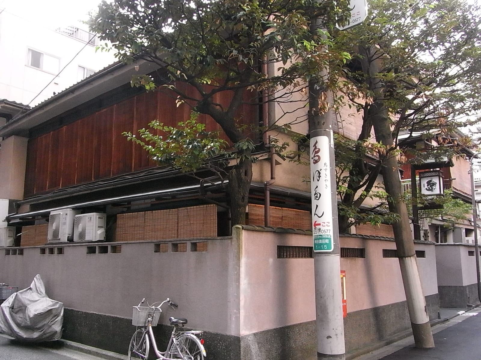 Botan's wooden building on a Kanda street corner