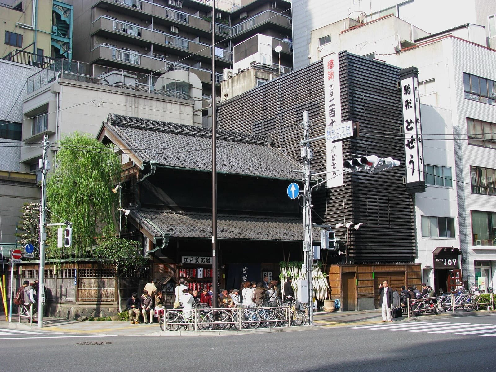 Komagata Dozeu's wooden two-storey front on a corner in Komagata