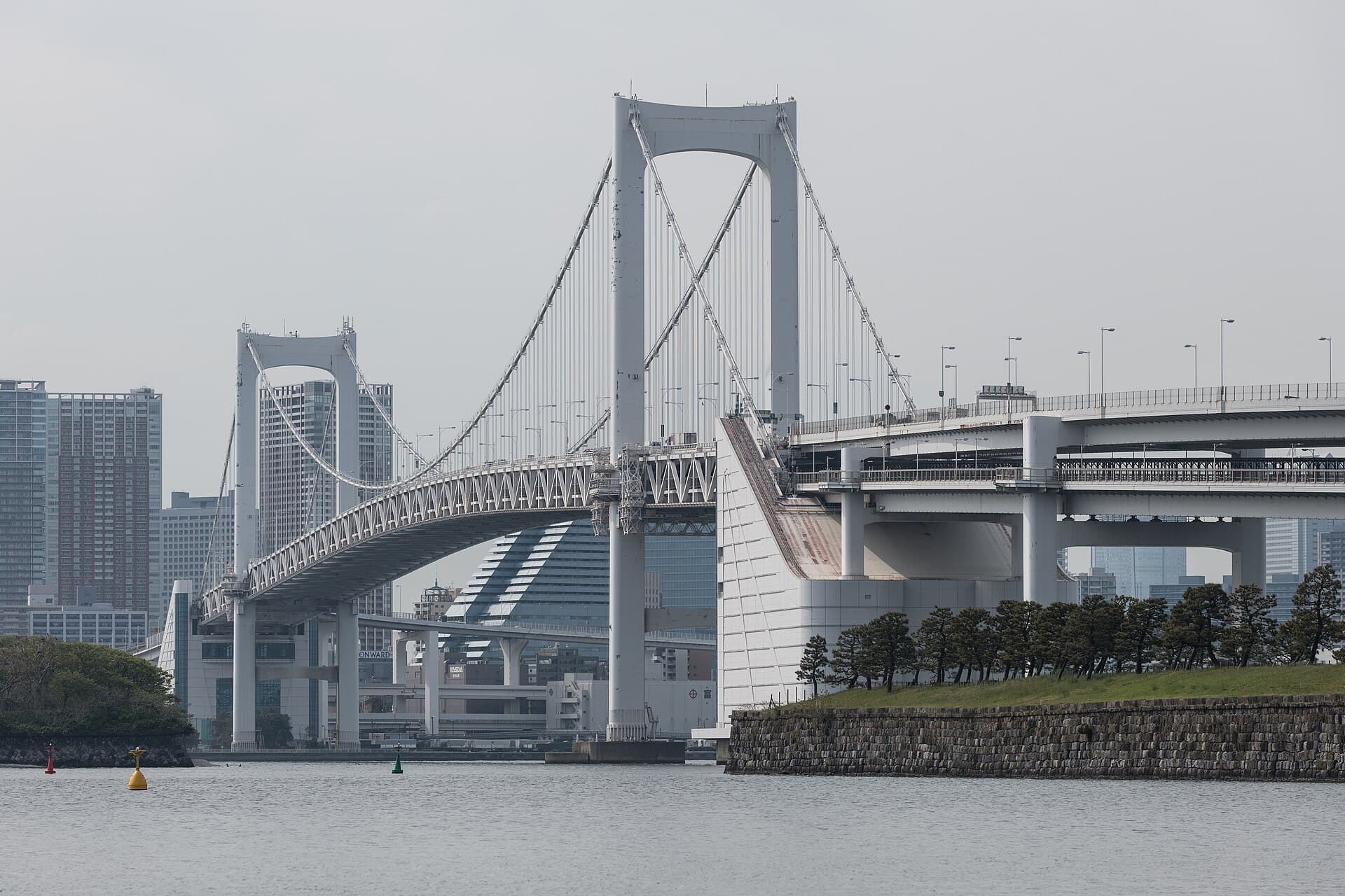 Rainbow Bridge and Tokyo Bay at night — the classic Andaz rooftop vista