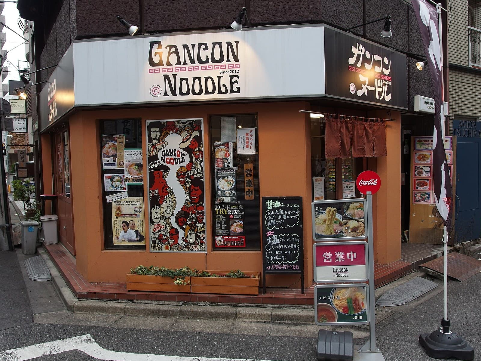 A Tokyo ramen shop on a street corner, with its shoyu ramen board outside