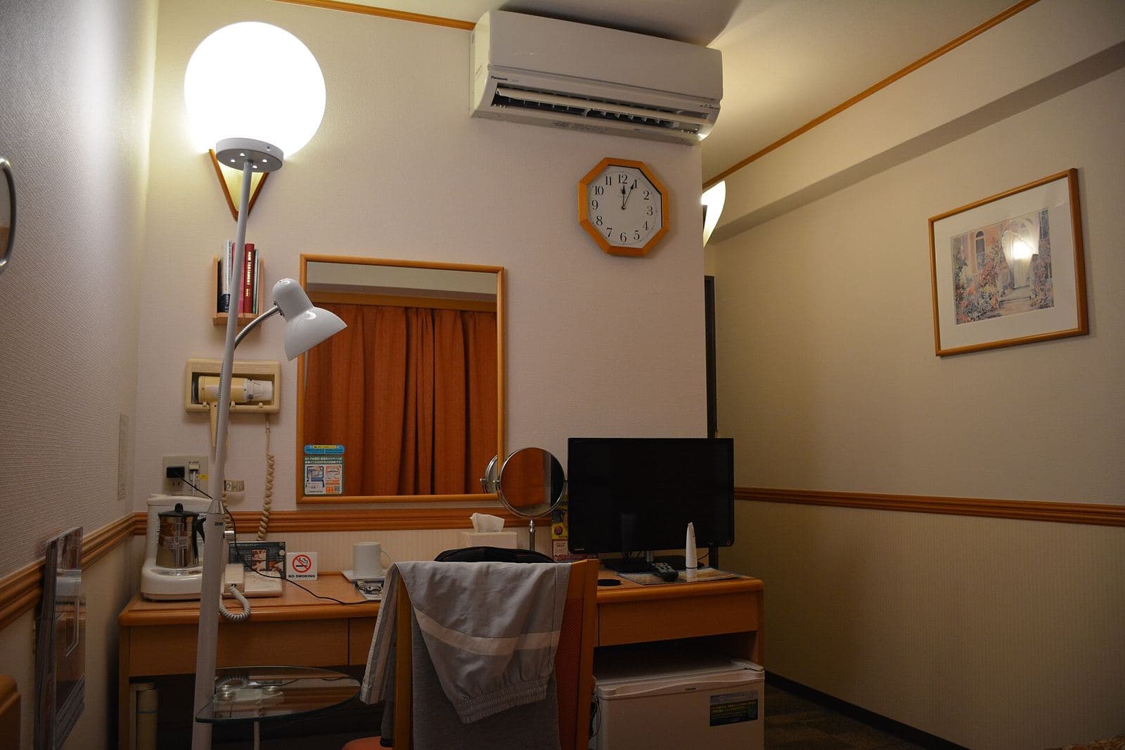 A Toyoko Inn room in Fukuoka: desk, kettle and a small fridge. Rooms at the chain's Tokyo branches are laid out much the same